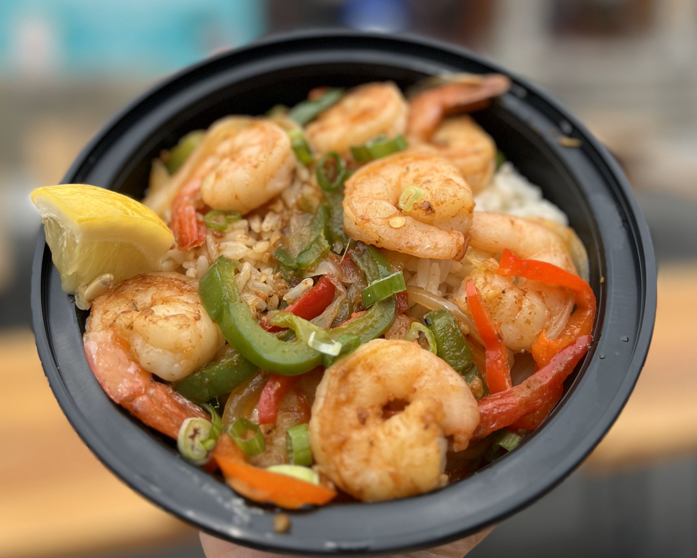photo of gluten free garlic shrimp and vegetables over rice in a bowl